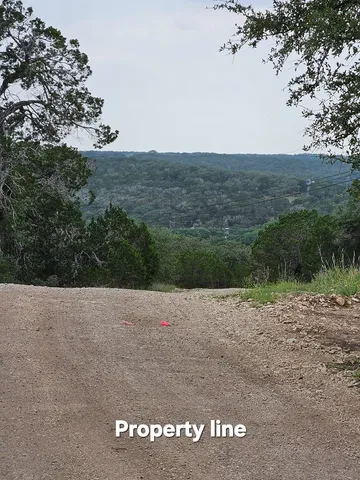 a view of a open space with mountain view