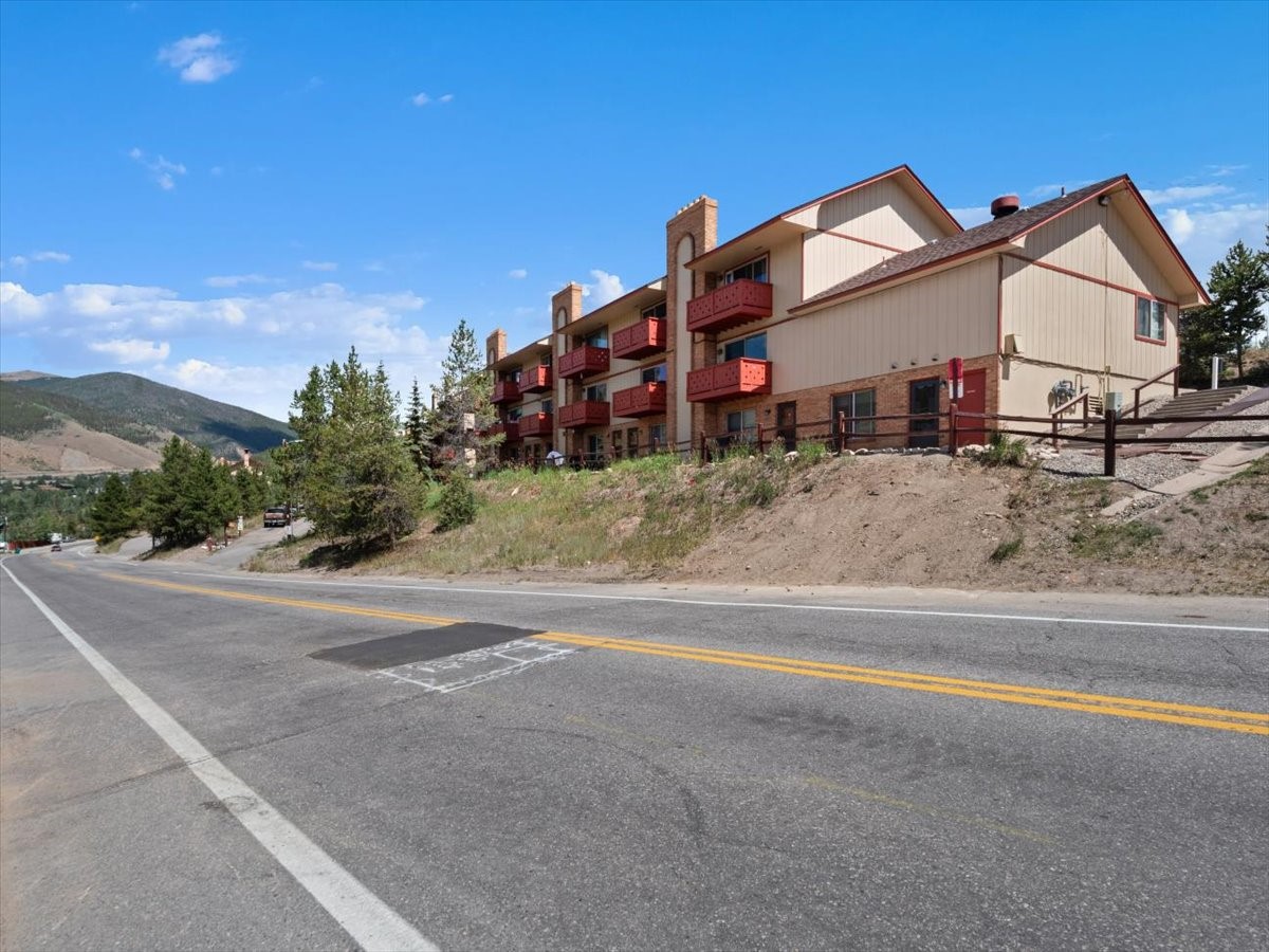 110 Evergreen Road, Unit 301 Dillon, CO 80435 - Photo 21 of 23 a view of a house with a yard and pathway