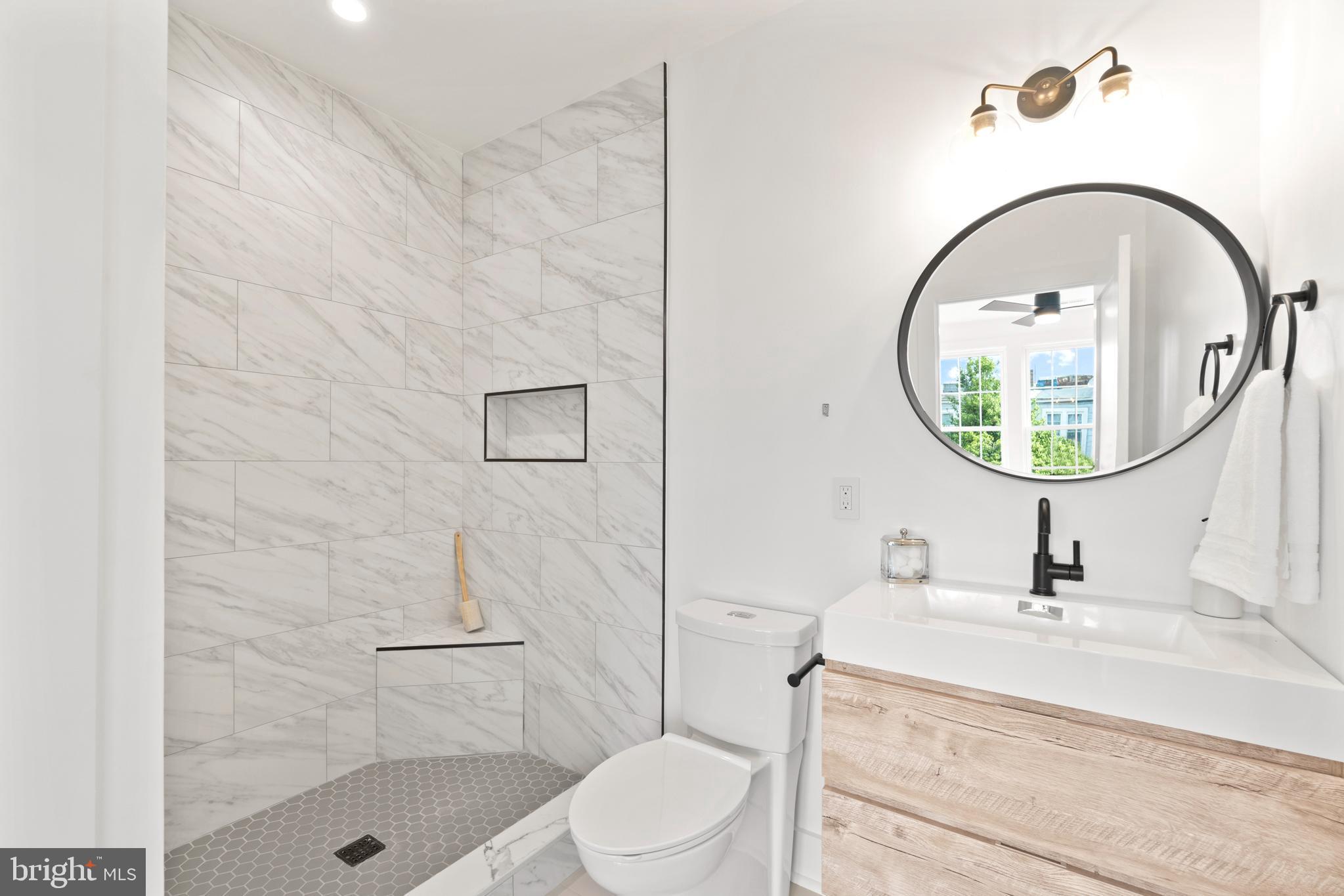 829 Decatur Street Northwest Washington, DC 20011 - Photo 14 of 42 Full en-suite bathroom with chic bathroom