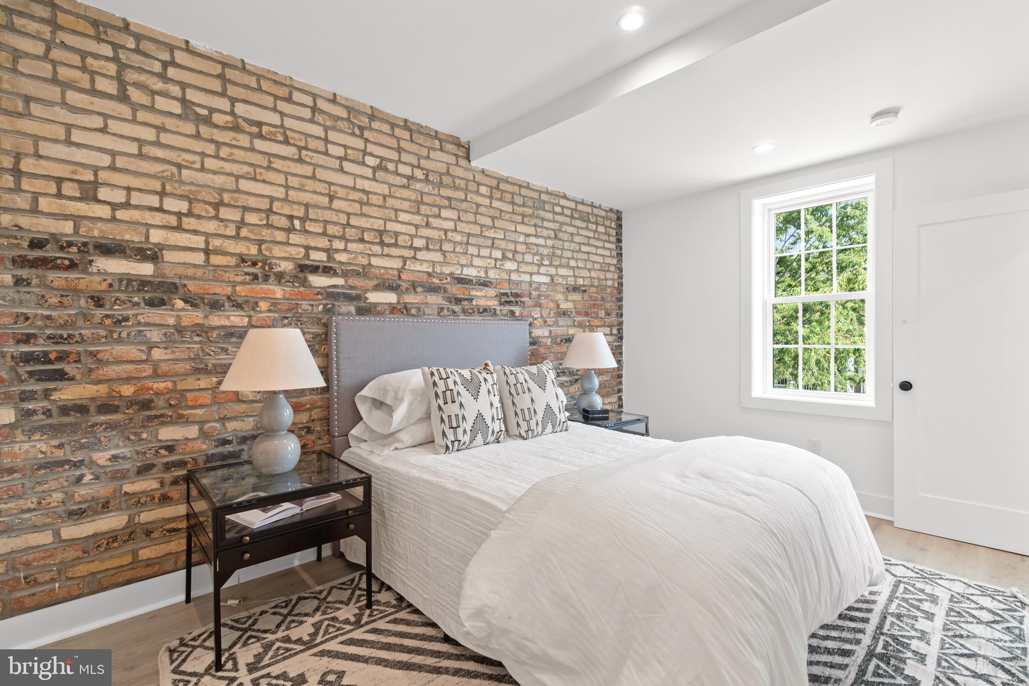 829 Decatur Street Northwest Washington, DC 20011 - Photo 16 of 42 Exposed brick and nice natural light