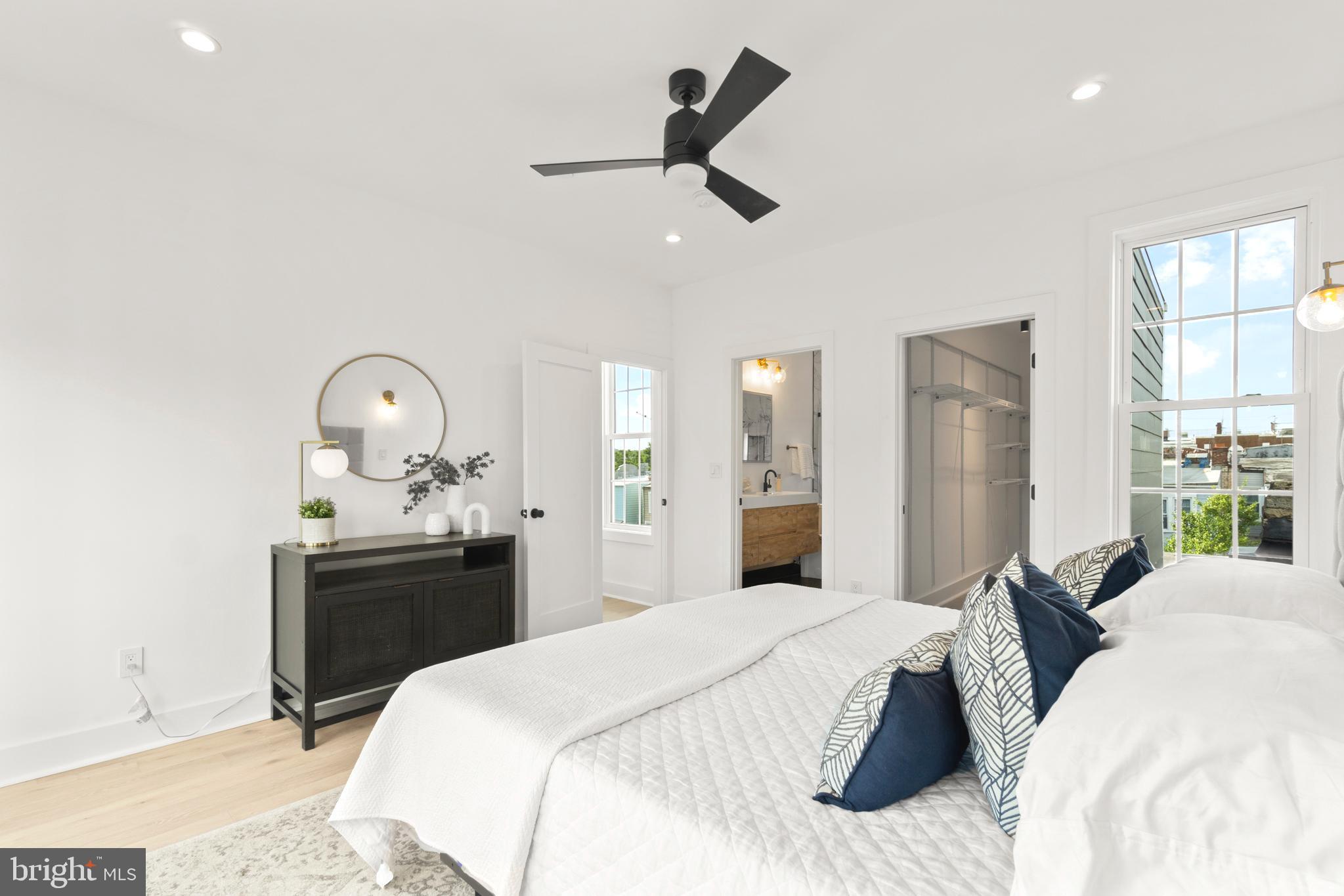 829 Decatur Street Northwest Washington, DC 20011 - Photo 21 of 42 Stylish ceiling fan, en-suite bathroom & deck