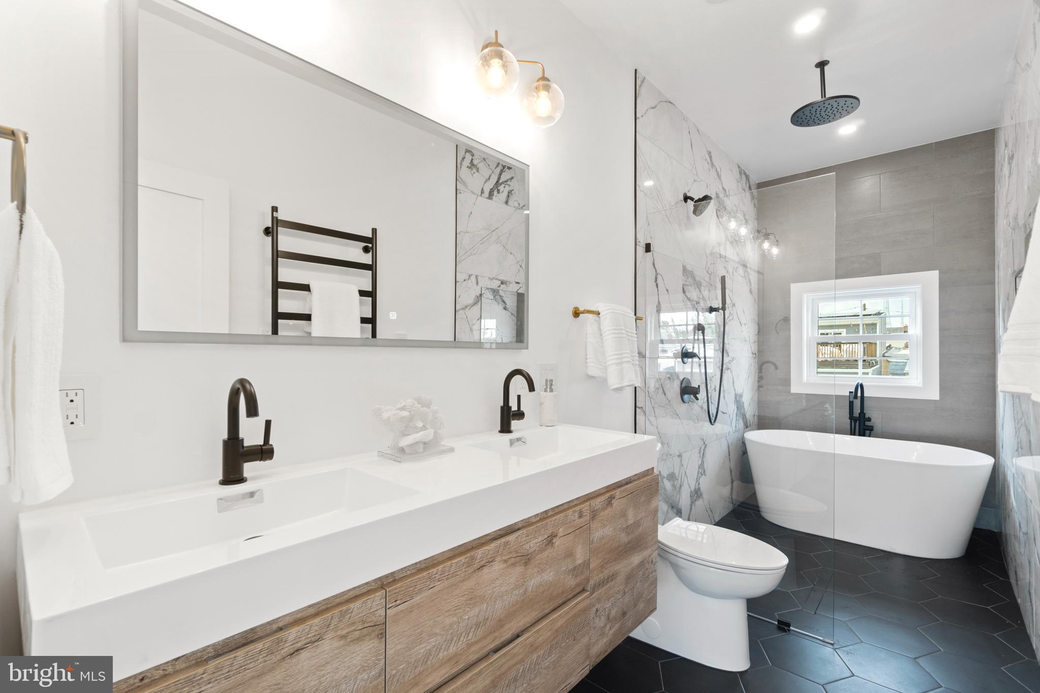 829 Decatur Street Northwest Washington, DC 20011 - Photo 23 of 42 Spa-like en-suite bathroom with a double vanity