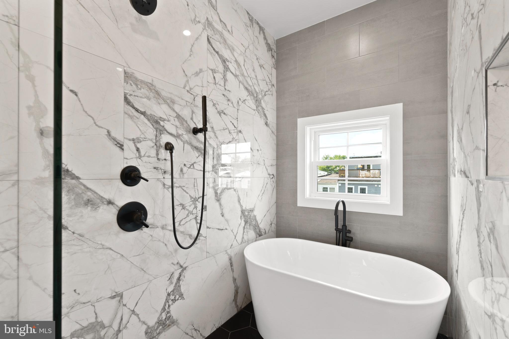 829 Decatur Street Northwest Washington, DC 20011 - Photo 24 of 42 Rain shower, handheld showerhead & soaking tub!