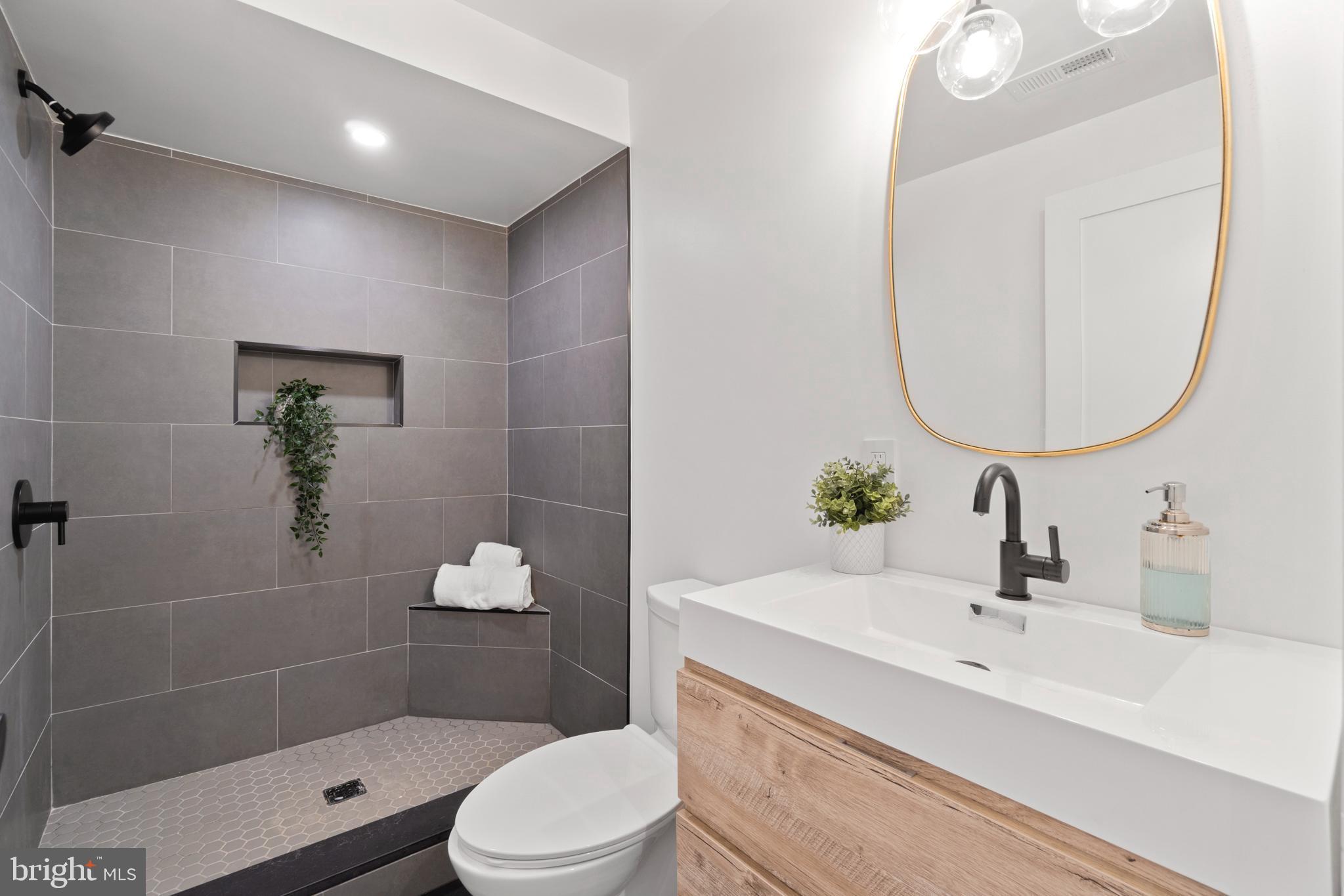 829 Decatur Street Northwest Washington, DC 20011 - Photo 31 of 42 Beautiful shower, vanity & mirro