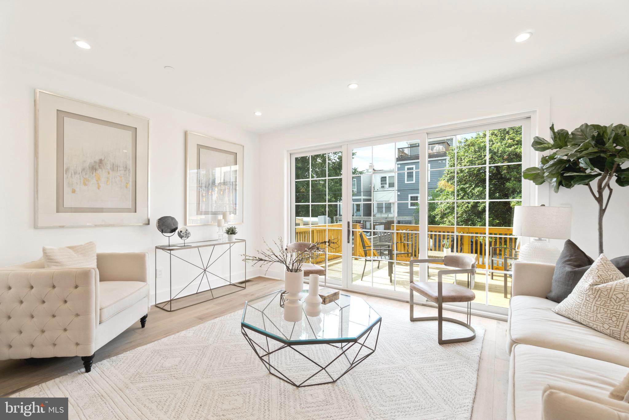 829 Decatur Street Northwest Washington, DC 20011 - Photo 5 of 42 Bright & open living room