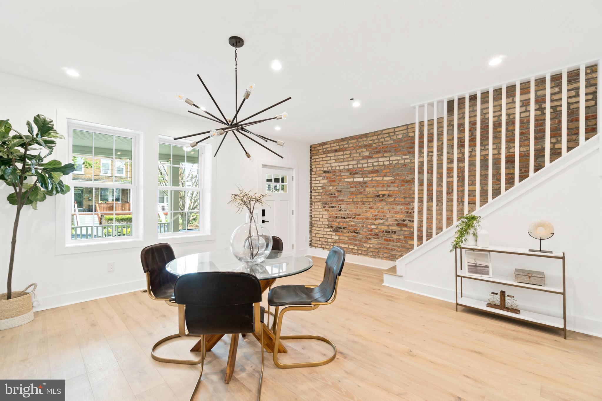 829 Decatur Street Northwest Washington, DC 20011 - Photo 6 of 42 Exposed brick & modern lighting