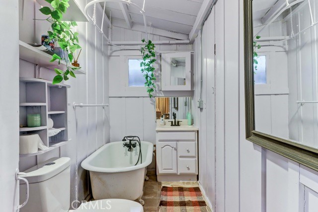 7553 McGroarty Street Tujunga, CA 91042 - Photo 11 of 38 a bathroom with a sink toilet and shower