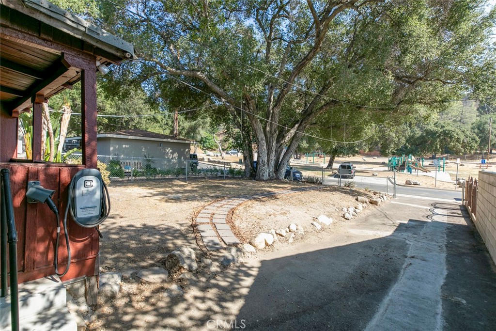 7553 McGroarty Street Tujunga, CA 91042 - Photo 14 of 38 a view of a backyard of the house