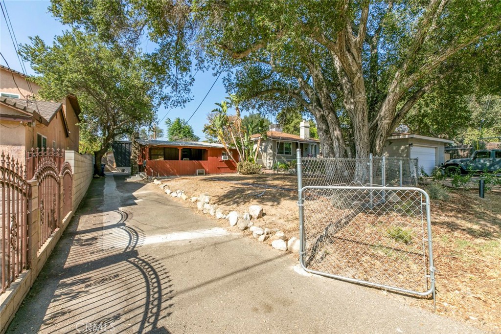 7553 McGroarty Street Tujunga, CA 91042 - Photo 2 of 38 front view of a house with a patio