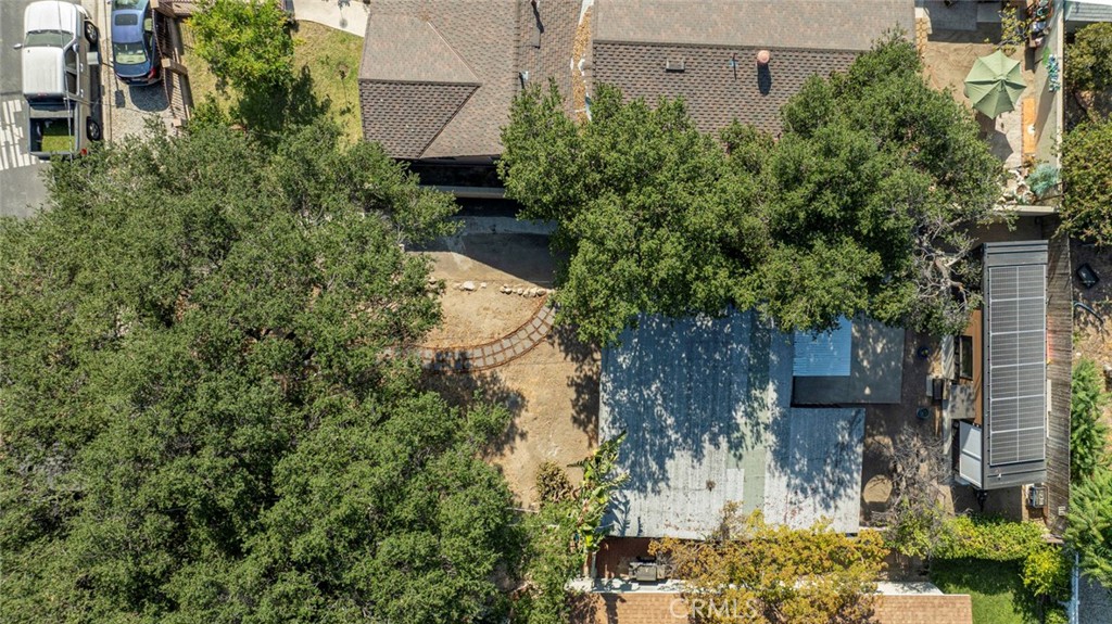 7553 McGroarty Street Tujunga, CA 91042 - Photo 34 of 38 an aerial view of a house with a yard and large trees