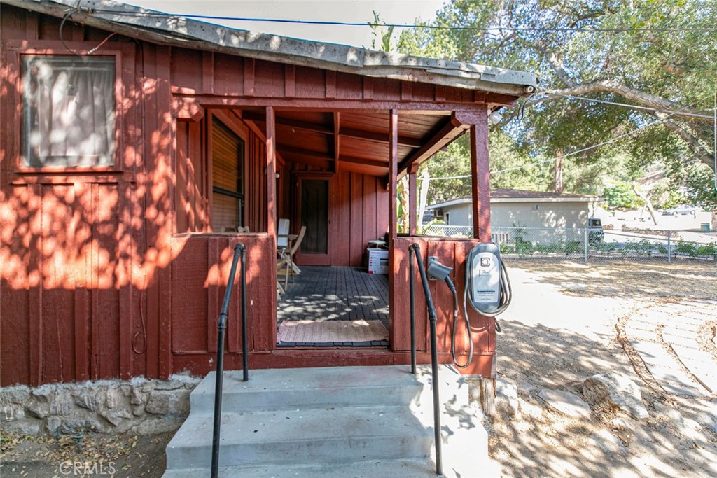 7553 McGroarty Street Tujunga, CA 91042 - Photo 5 of 38 a view of a porch with wooden floor