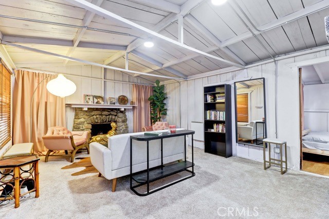 7553 McGroarty Street Tujunga, CA 91042 - Photo 7 of 38 a living room with furniture and a fireplace