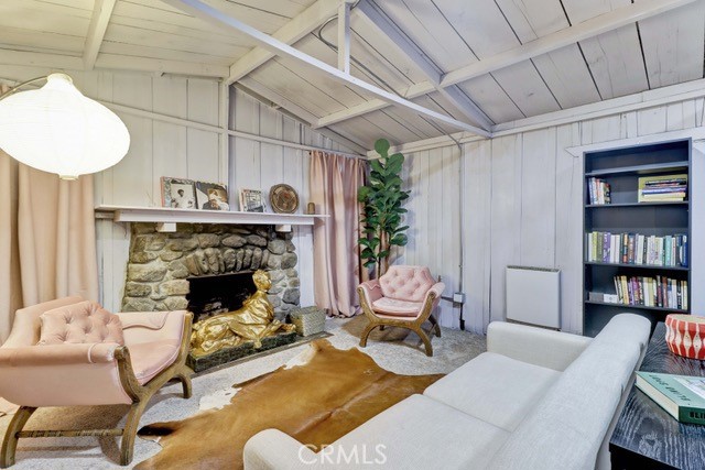 7553 McGroarty Street Tujunga, CA 91042 - Photo 8 of 38 a living room with furniture and a fireplace