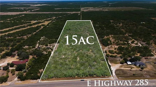 a view of a street with a sign board