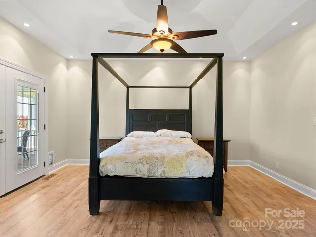 a bed room with a bed and a window