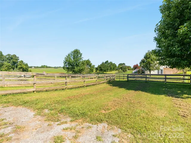a view of a lake with a big yard