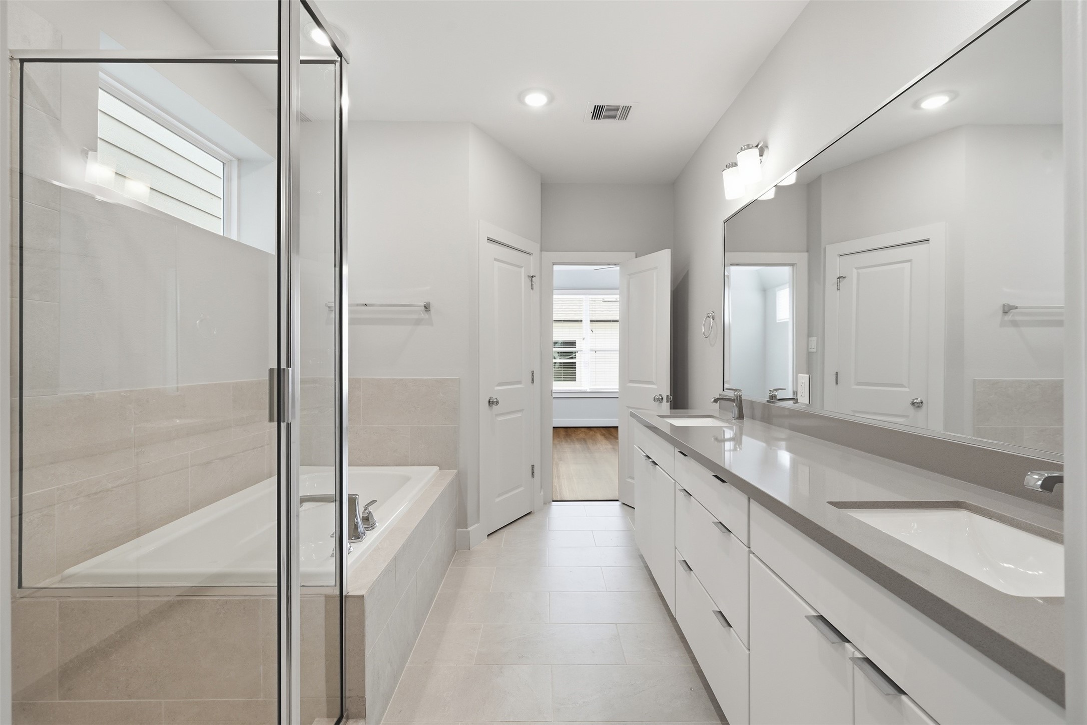 1282 North Post Oak Road, Unit A Houston, TX 77055 - Photo 17 of 23 Dual sinks in primary bathroom