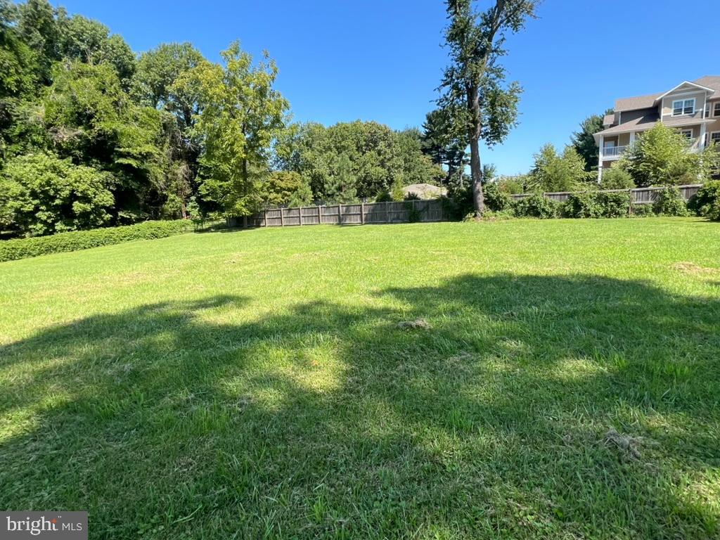 13719 Notley Road Silver Spring, MD 20904 - Photo 6 of 8 a view of green field with trees in the background