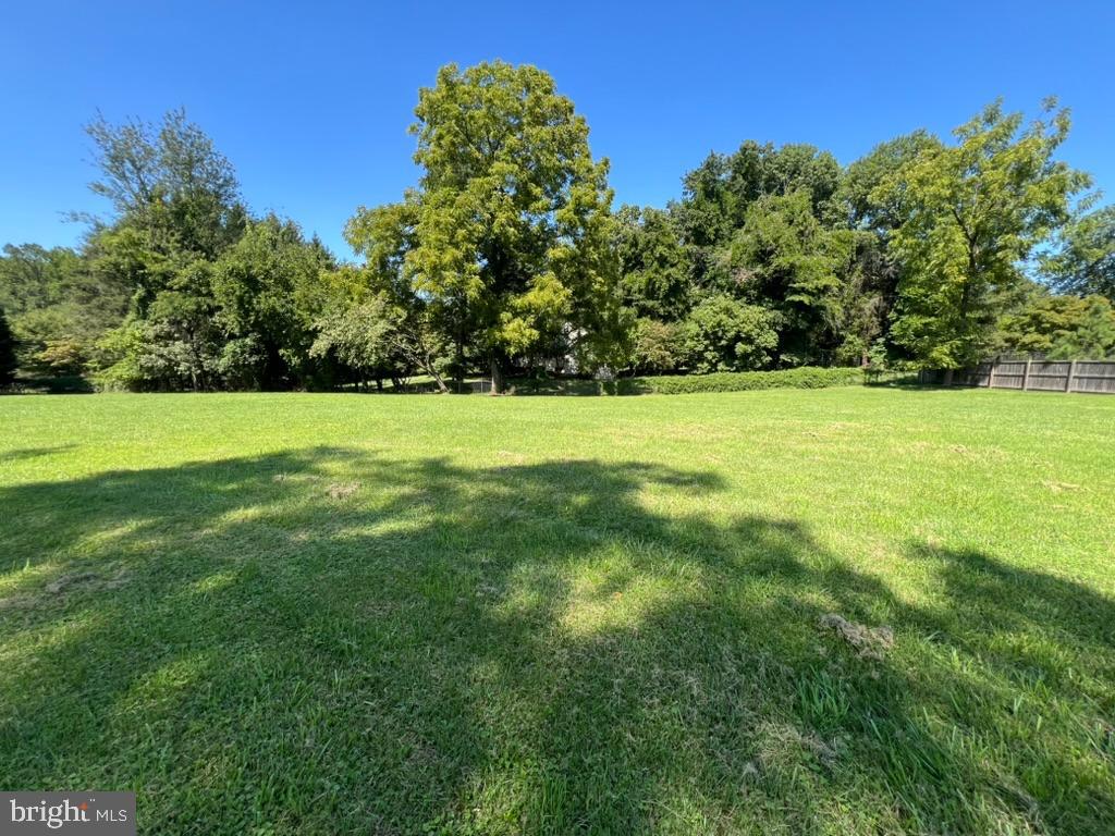 13719 Notley Road Silver Spring, MD 20904 - Photo 8 of 8 a view of field with trees in the background