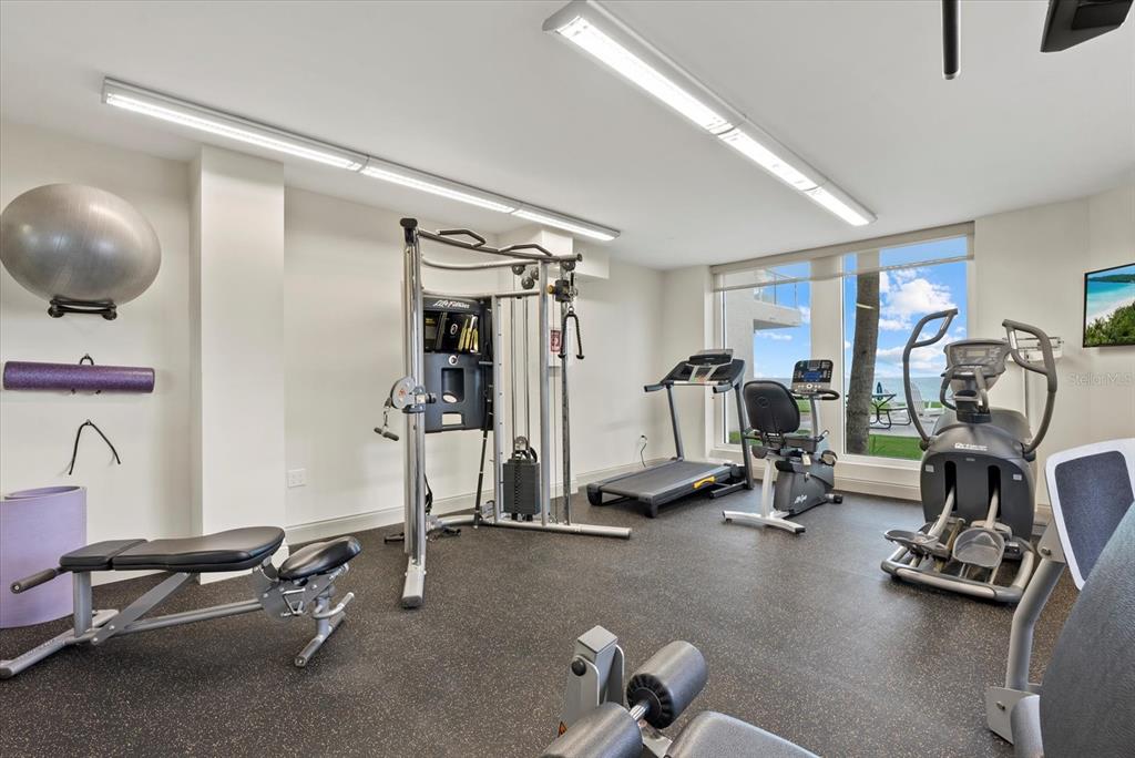 1000 Longboat Club Road, Unit 1001 Longboat Key, FL 34228 - Photo 26 of 40 a view of a room with gym equipment