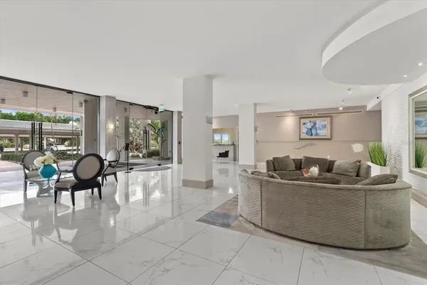 a living room with furniture and a table