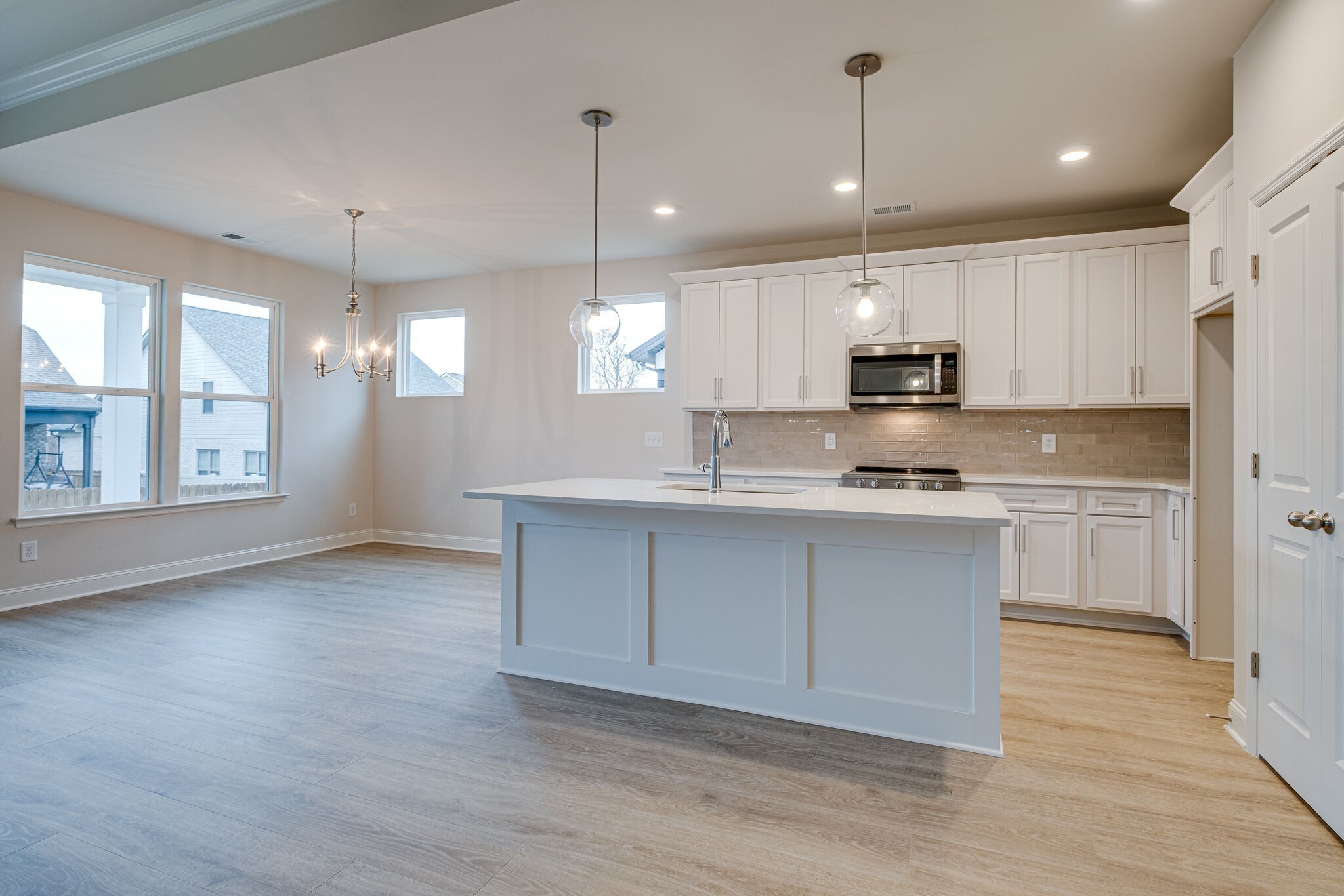 3017 Fanshaw Road Smyrna, TN 37167 - Photo 12 of 39 a kitchen with kitchen island granite countertop a sink a counter space appliances and cabinets