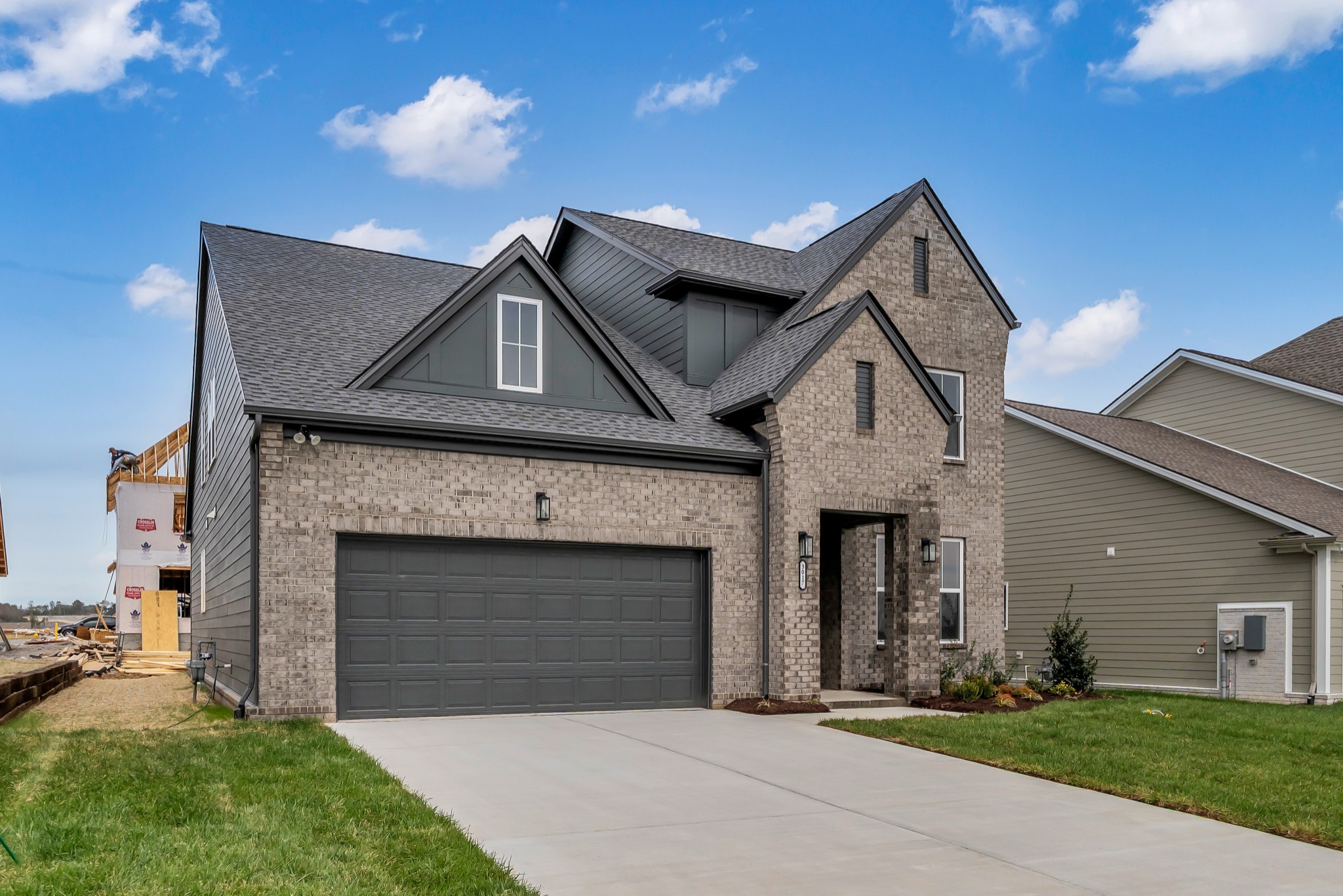 3017 Fanshaw Road Smyrna, TN 37167 - Photo 2 of 39 a front view of a house with a garden and yard