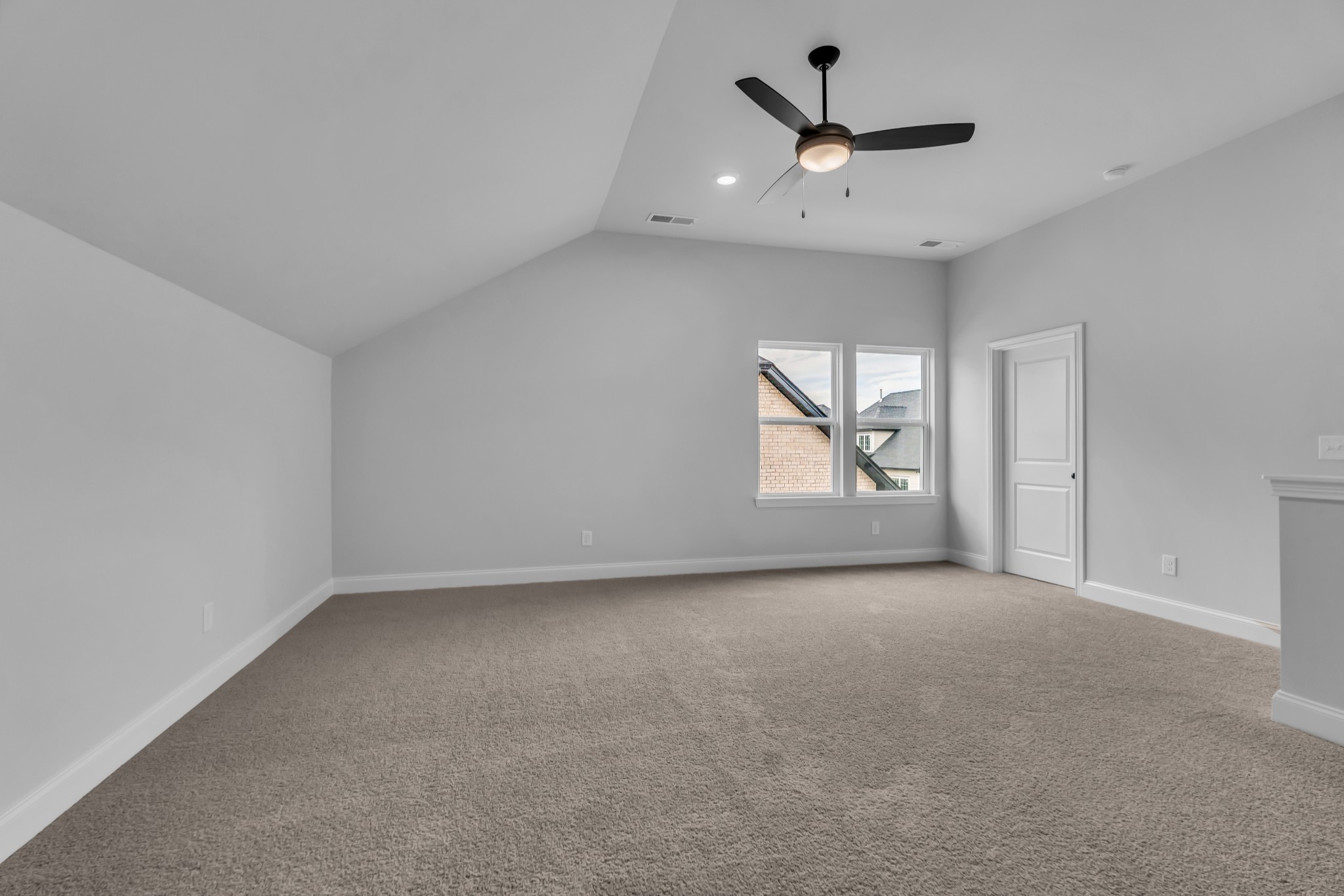3017 Fanshaw Road Smyrna, TN 37167 - Photo 21 of 39 an empty room with chandelier fan and windows