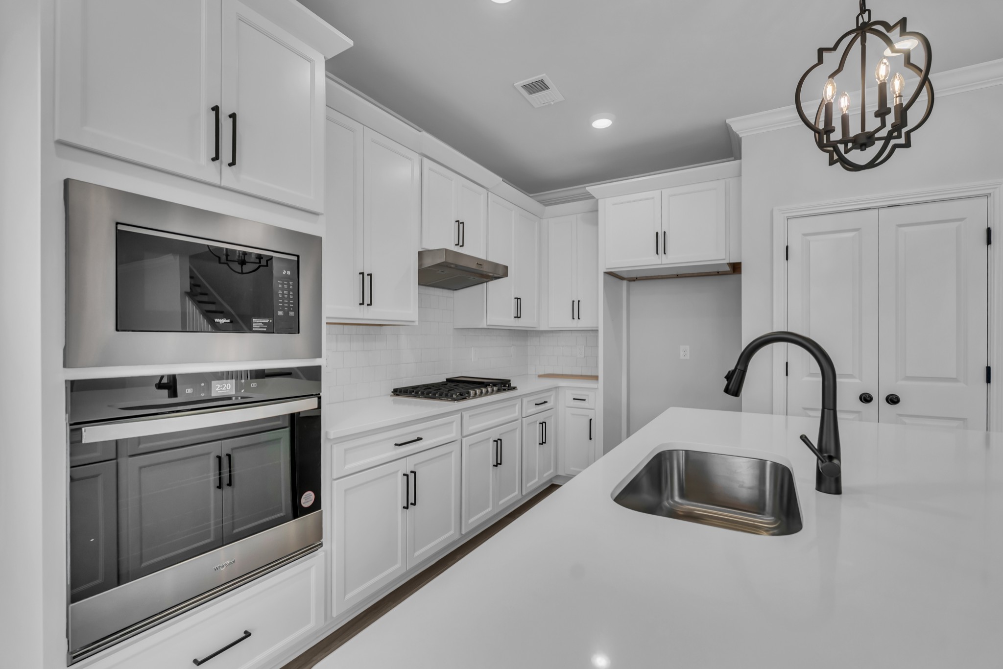 3017 Fanshaw Road Smyrna, TN 37167 - Photo 26 of 39 a kitchen with stainless steel appliances granite countertop a sink a stove and cabinets