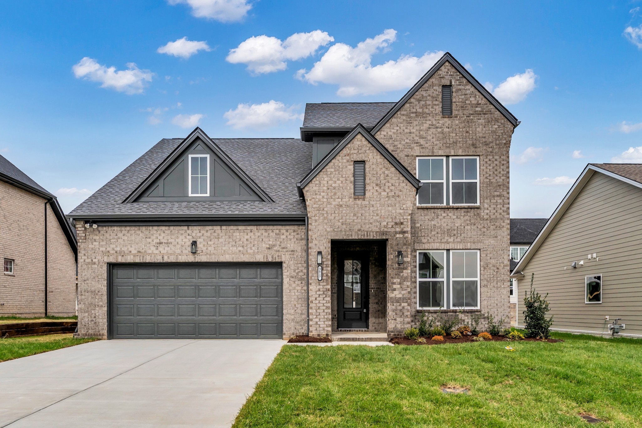 3017 Fanshaw Road Smyrna, TN 37167 - Photo 3 of 39 a front view of a house with garden