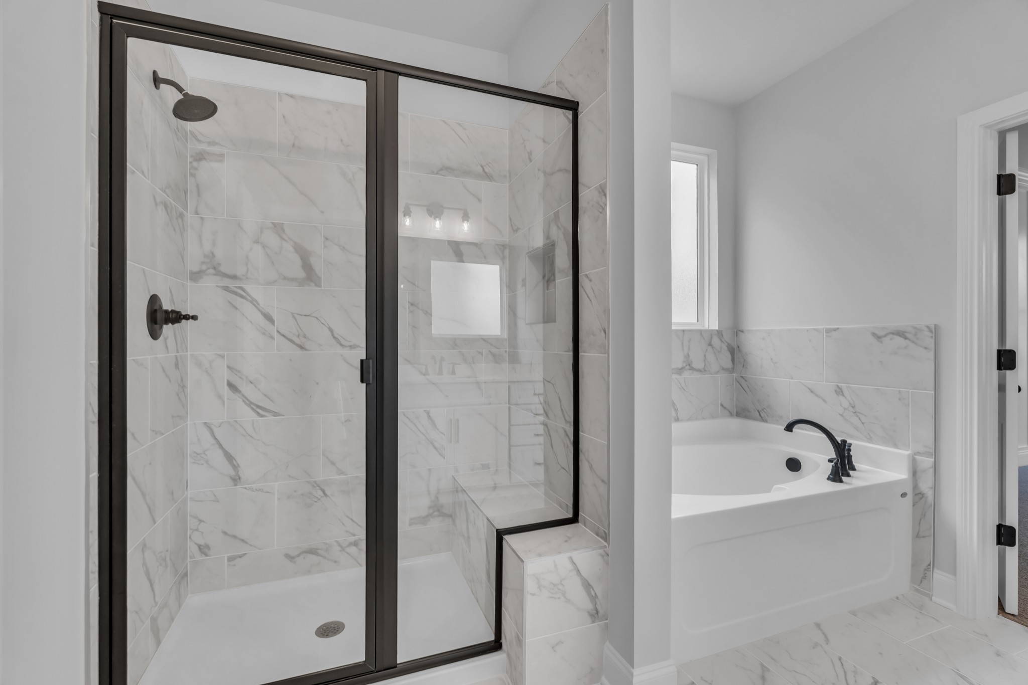 3017 Fanshaw Road Smyrna, TN 37167 - Photo 31 of 39 a bathroom with a bathtub and shower