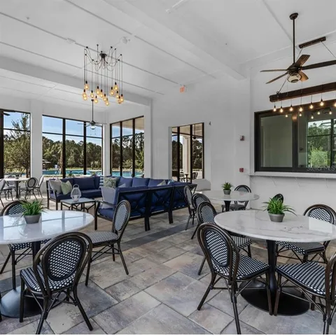 an aerial view of a house with outdoor space
