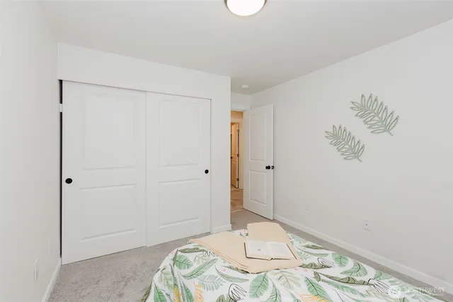 a view of a house with backyard porch and sitting area