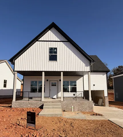 a front view of a house with a patio