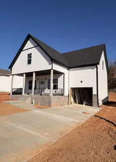 a view of a house with snow on the wall