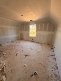a view of empty room with windows
