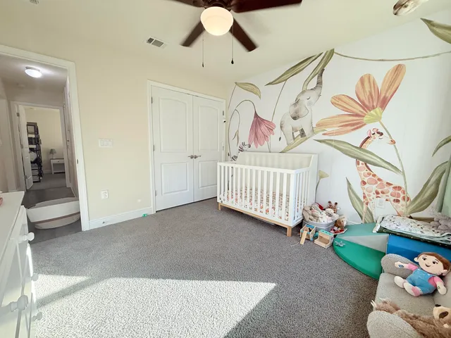 a view of a livingroom with furniture and toys