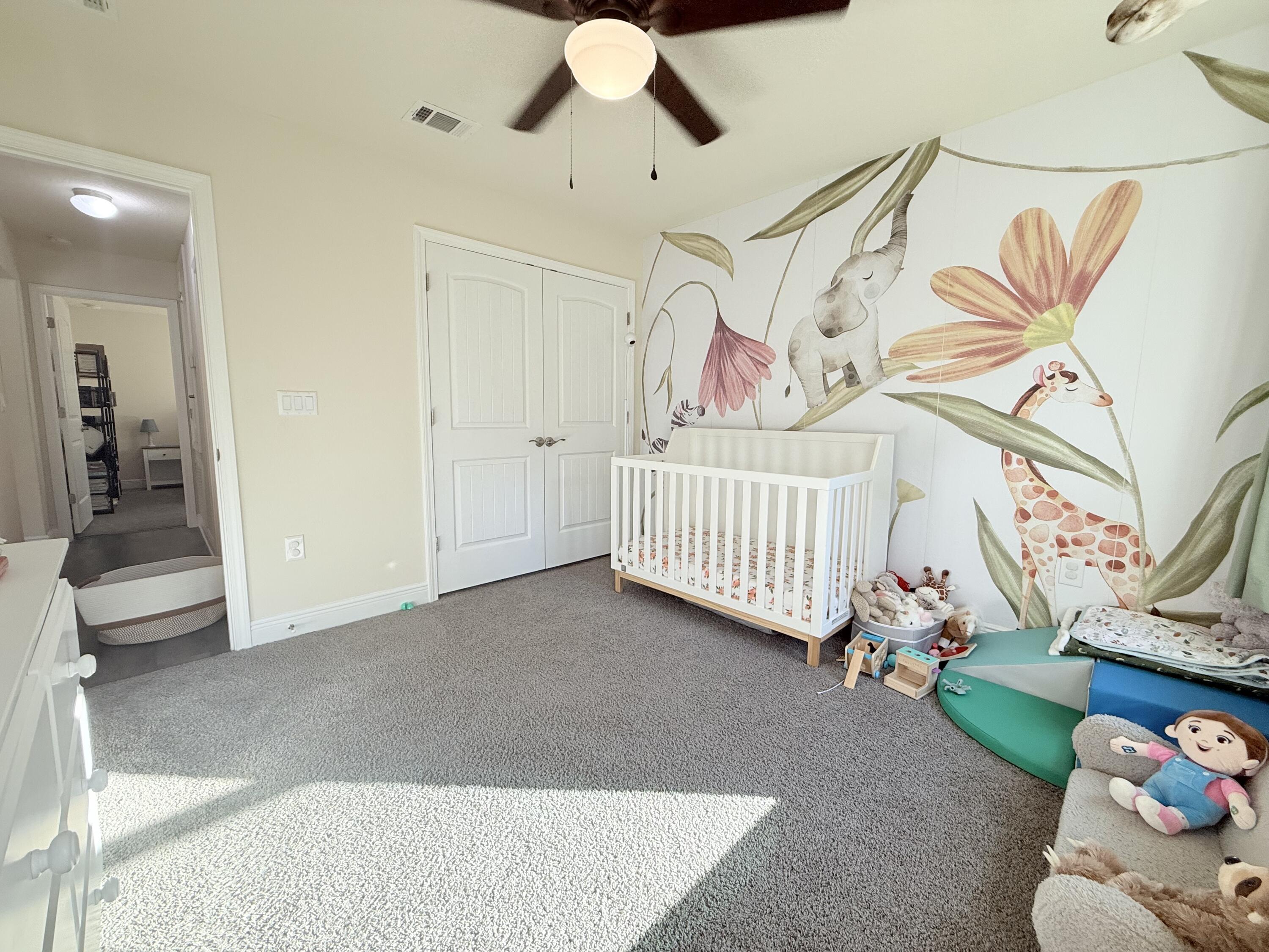 3315 Doyle Hawkins Road Navarre, FL 32566 - Photo 19 of 36 a view of a livingroom with furniture and toys