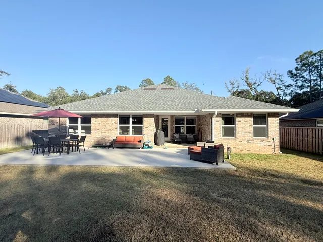 a view of a house with patio