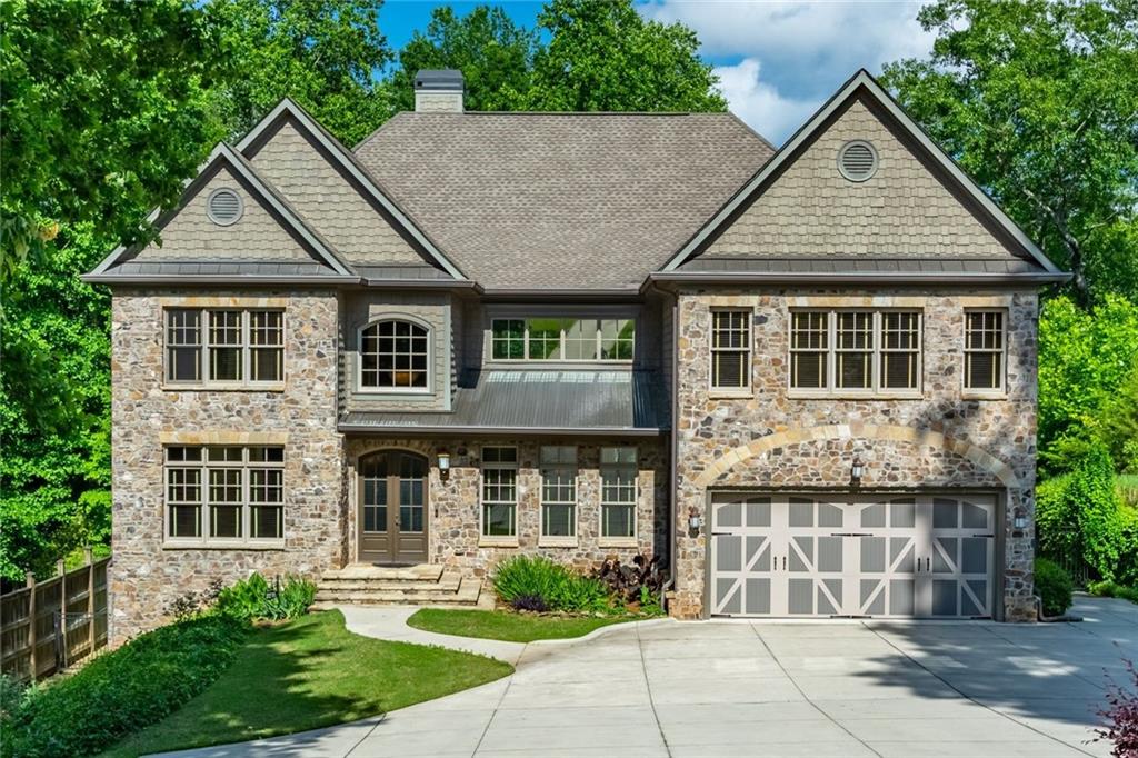 3216 Clarks Bridge Road Gainesville, GA 30506 - Photo 1 of 1 Stone, Brick and cedar shake exterior. No to low maintenance exterior.