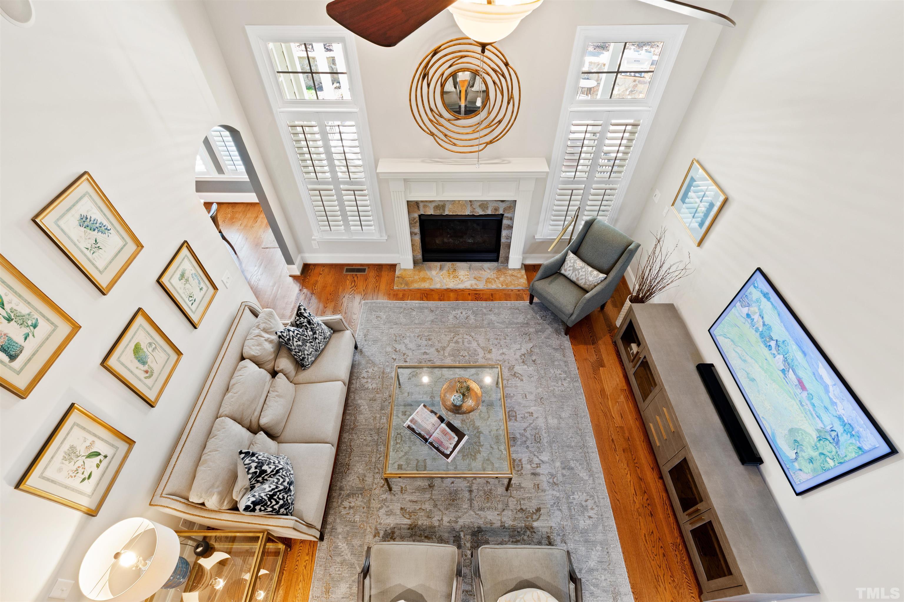 761 Wimbleton Drive Raleigh, NC 27609 - Photo 20 of 70 a view of living room with furniture and a fireplace