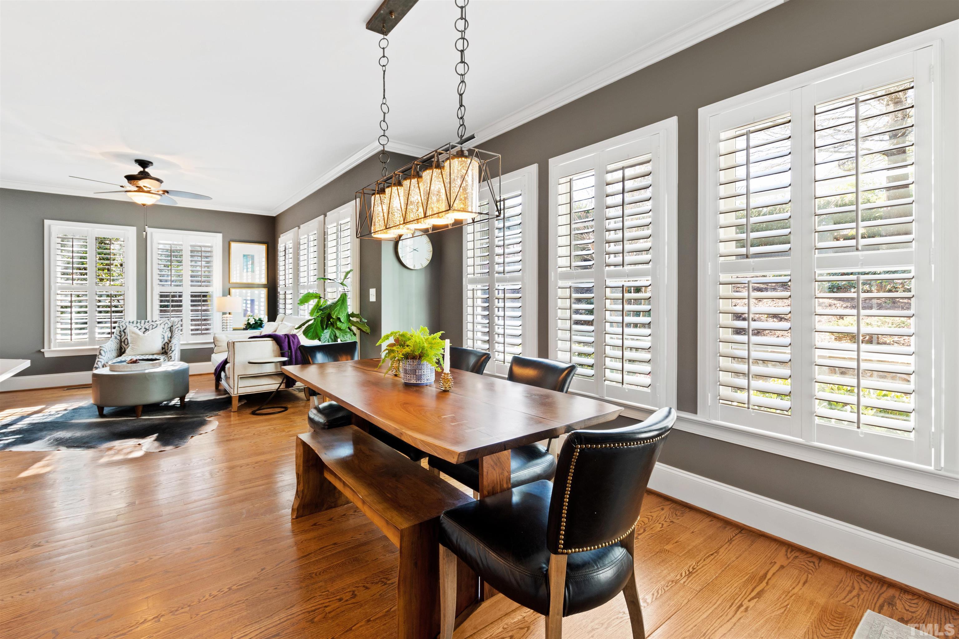 761 Wimbleton Drive Raleigh, NC 27609 - Photo 30 of 70 a view of a dining room with furniture window and wooden floor