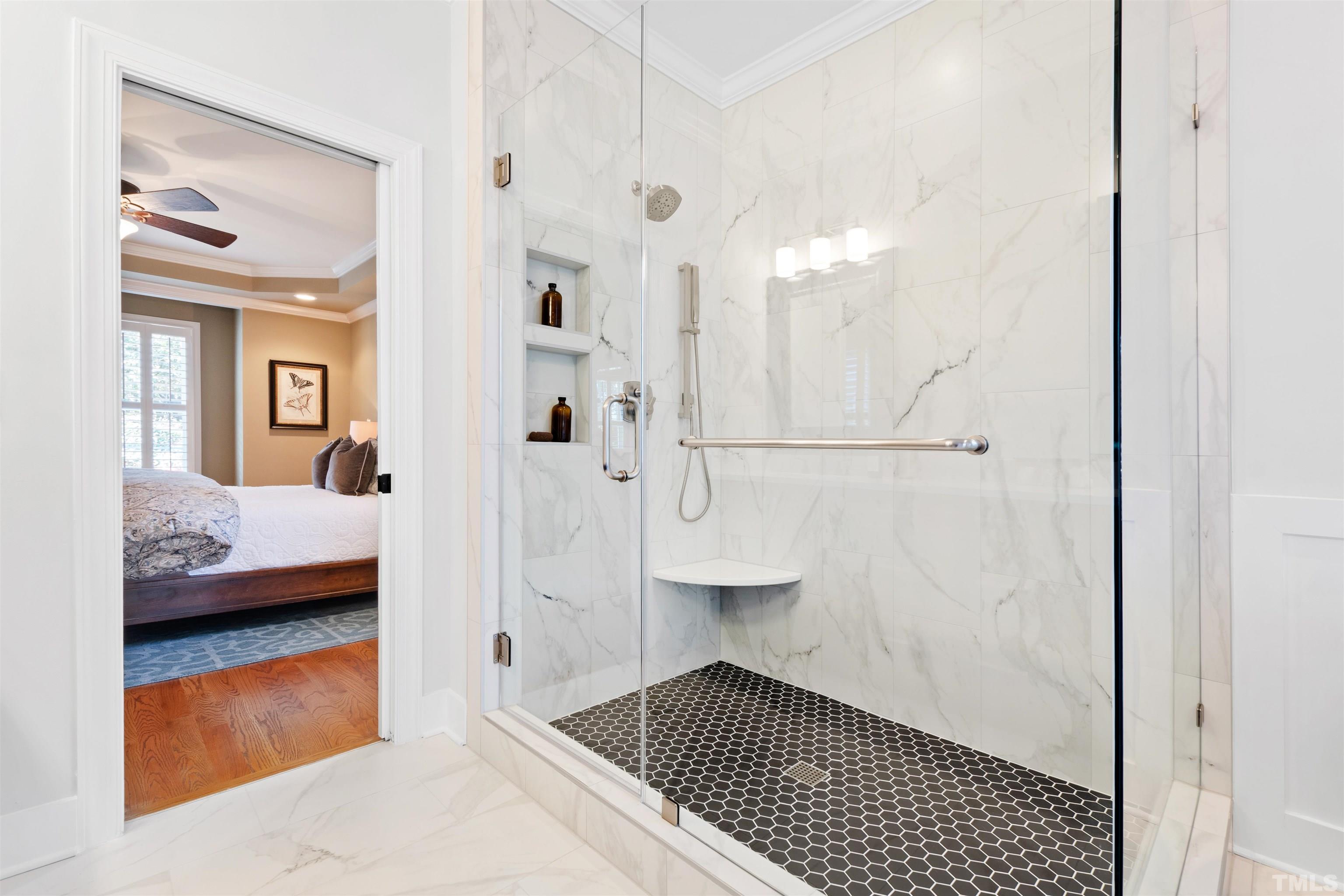 761 Wimbleton Drive Raleigh, NC 27609 - Photo 38 of 70 a bedroom with a bed and a view of bedroom