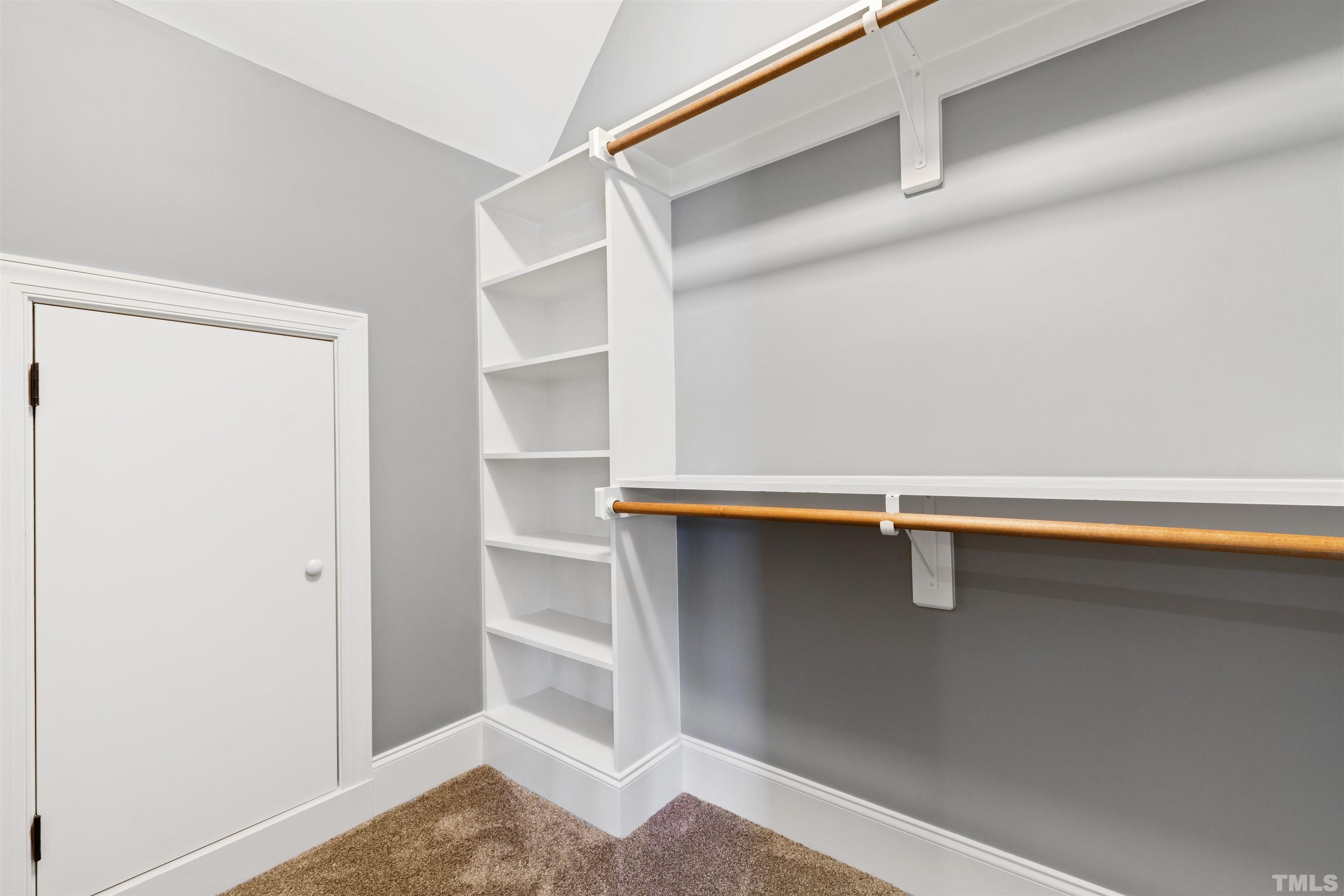 761 Wimbleton Drive Raleigh, NC 27609 - Photo 60 of 70 a view of an empty walk in closet