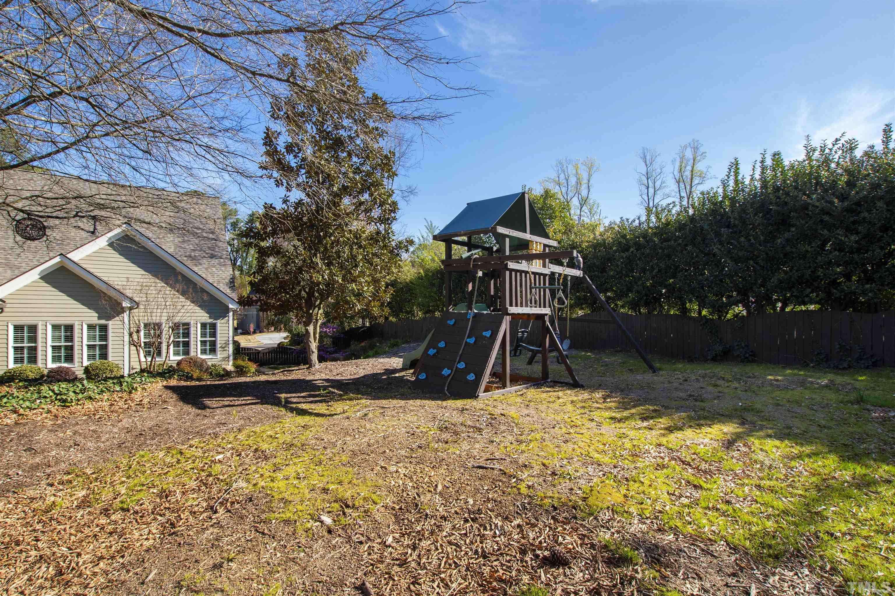 761 Wimbleton Drive Raleigh, NC 27609 - Photo 69 of 70 a view of a house with a yard