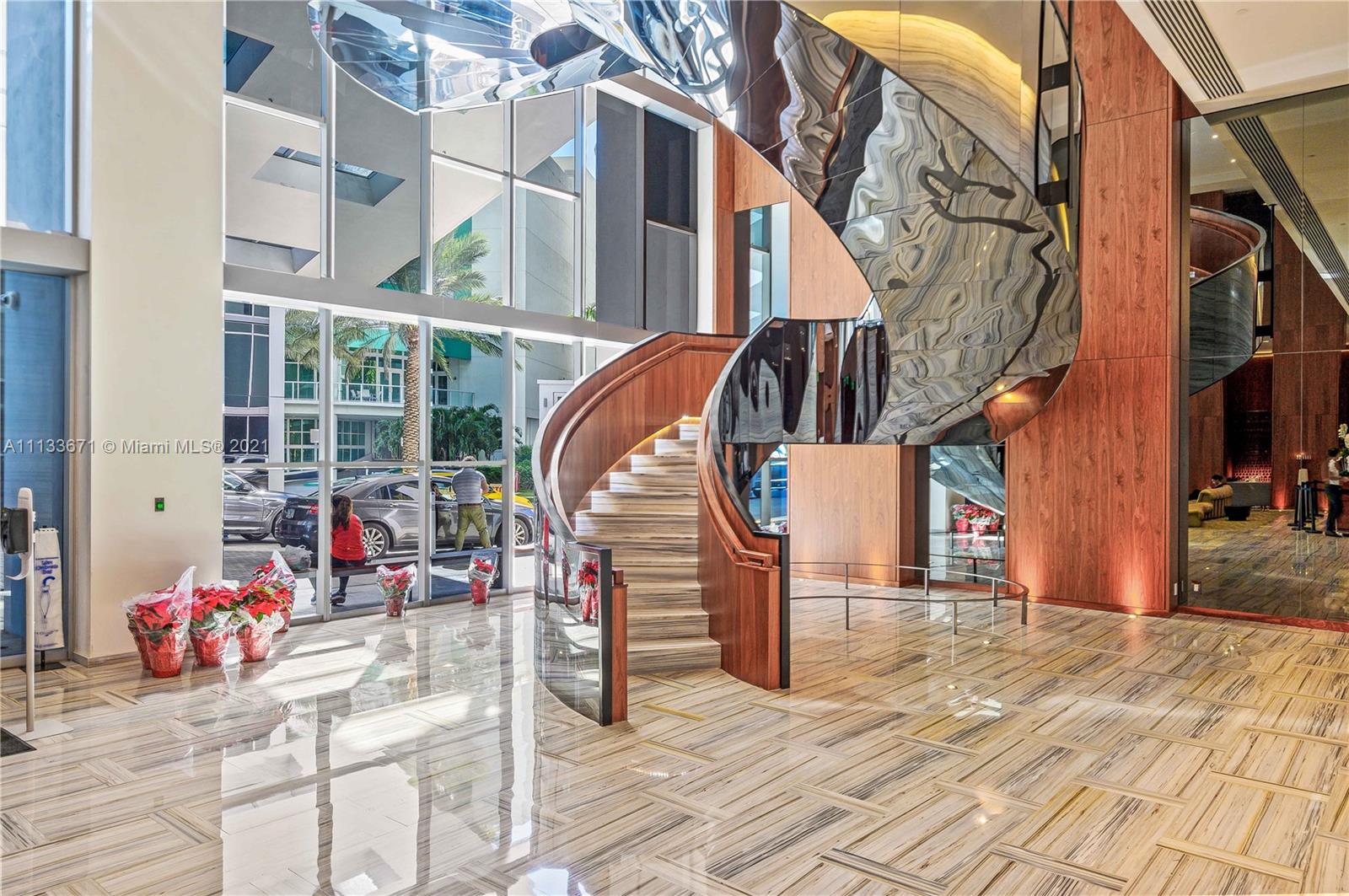 1300 Brickell Bay Drive, Unit 1603 Miami, FL 33131 - Photo 2 of 32 a view of roof deck with furniture