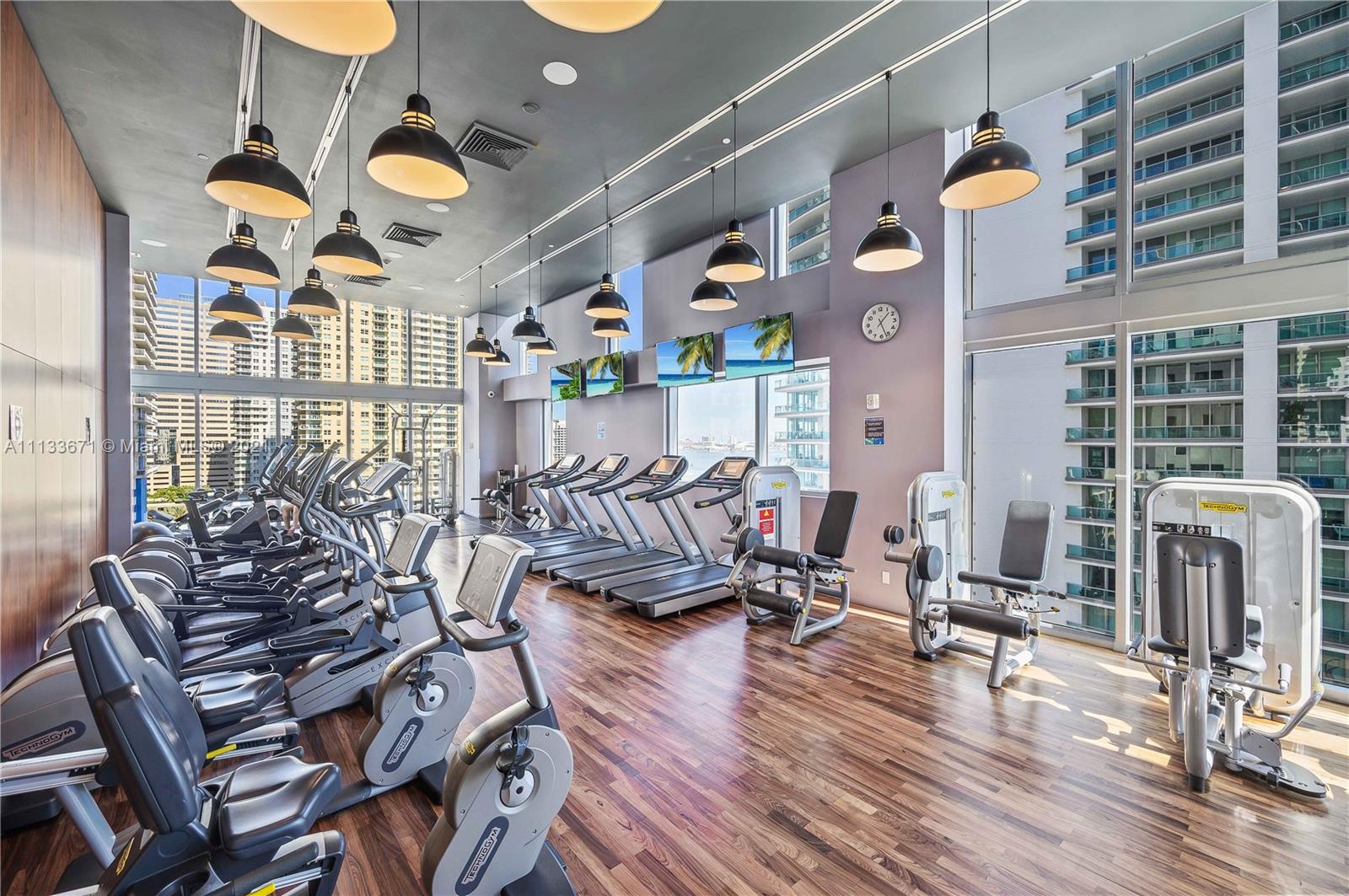 1300 Brickell Bay Drive, Unit 1603 Miami, FL 33131 - Photo 27 of 32 a view of a room with gym equipment