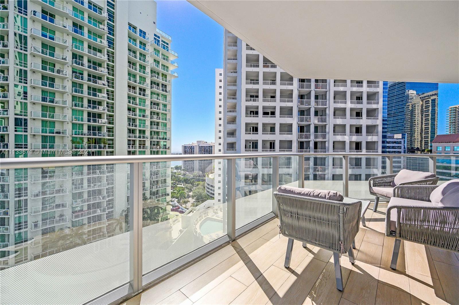1300 Brickell Bay Drive, Unit 1603 Miami, FL 33131 - Photo 3 of 32 a view of a room with a large windows