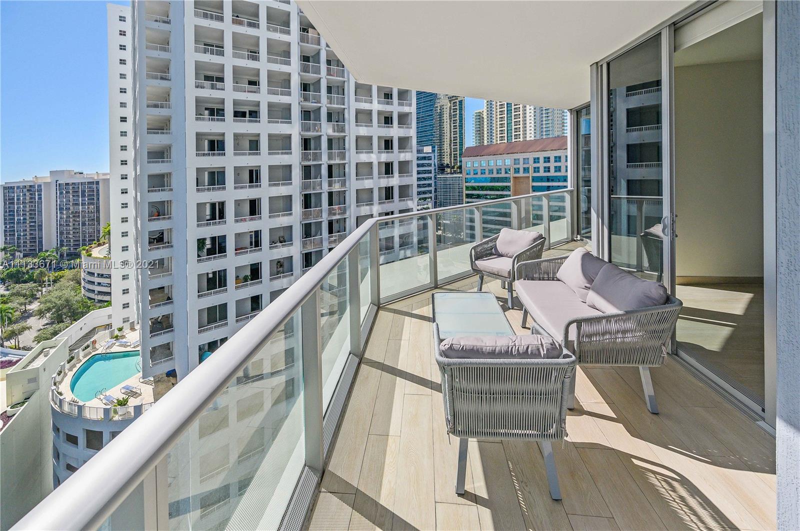 1300 Brickell Bay Drive, Unit 1603 Miami, FL 33131 - Photo 4 of 32 a view of balcony with furniture