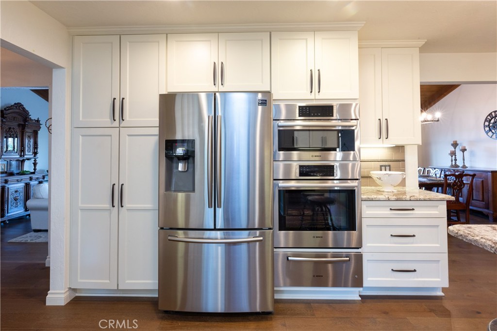 2509 Valerie Drive Fallbrook, CA 92028 - Photo 22 of 70 a kitchen with stainless steel appliances a refrigerator stove and microwave